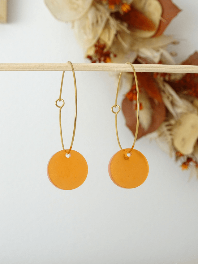 Pastille orange sur créole