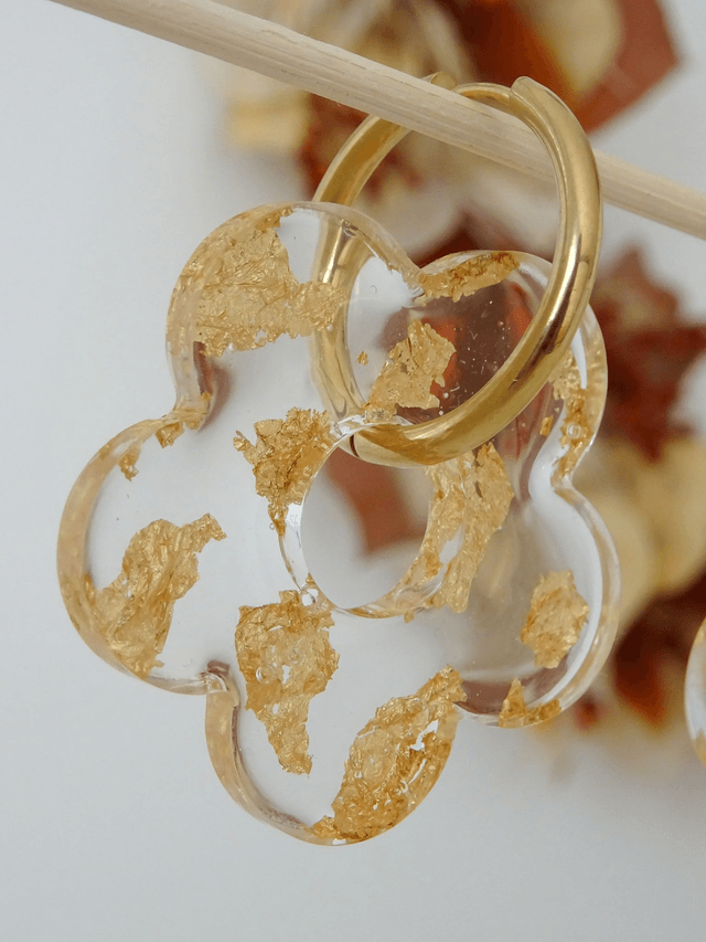 Grande fleur : Transparente feuilles dorées