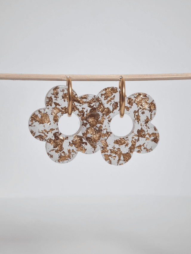 Grande fleur : feuilles dorées